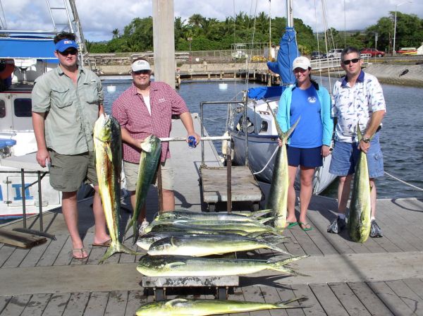 10-10-07
Back home Drew, Keith, Michelle and Kevin would have called them Dolphin fish. Out here  in the Pacific we call them Mahi Mahi. Either way, these anglers from the Gulf of Mexico had the best day of Dolphinmahi  fishing they had ever seen. Sweet!
