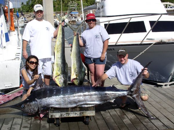 10-11-08
Lily, Brian, Laura and Pablo got a nice Marlin and a few fat Mahi Mahi. All right!
