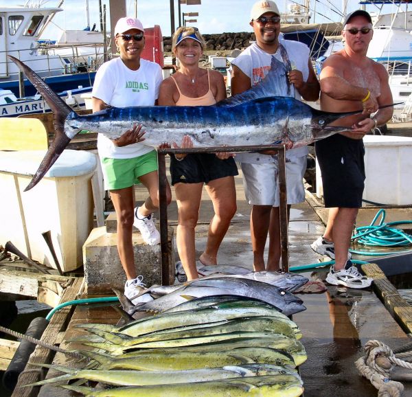 Foxy Lady 10-3-05
Lesa, Michele, Nathan and James knocked 'em dead! 8 Mahi Mahi, 3 big Tunas and a nice 100 pound Striped Marlin. This was a fun day with a great group of people. Hope to see you next year.
