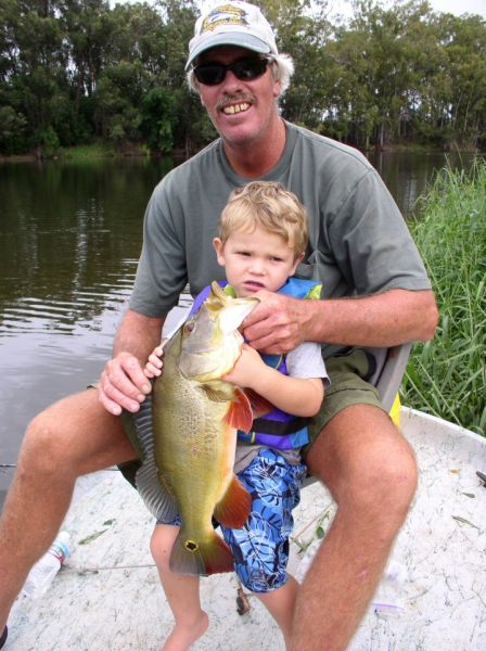 Old Grizzle and Lil' Grizzle with a nice Peacock Bass
