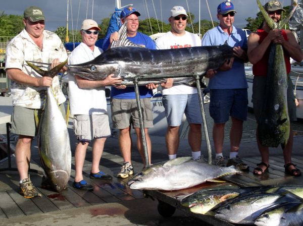 11-10-07
Randy, Brad, David, Gene, Aaron and Michael with their 200# Blue Marlin. Every man took a turn battling this fish. The guys rounded out the day with some nice fat Yellowfin Tuna and big Mahi Mahi. Congratulations!
