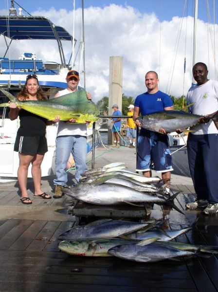11-17-07
Selina set up a fishing trip for her husband Richard and his friends Kenneth and Randolph. The Yellowfin were nibblin' and the big Mahi Mahi's put on a great show. It just doesn't get any better!
