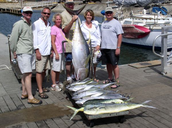 5-1-08
Yee Haa! Another Ahi! This 155 pounder is the biggest Yellowfin Tuna for the year. Congratulations to Ty, RJ, Sue, Stan, Marian and Mike on a really nice fish. Judging by the cart load of Mahi Mahi and Yellowfin Tuna and the smiles everyone's faces, it was a great day on the water.
