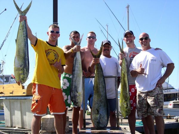 Foxy Lady 5-28-05
Rob, Adam, Zach, Lawrence, Ryan and Matt managed to find 4 cooperative Mahi Mahi. Lawrence's big bull weighed 31 pounds. 
Nice job guys!
