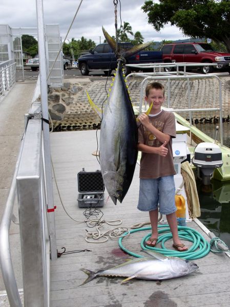 Foxy Lady 6-4-07
Here's young Jeff with his 113# Ahi. That fish probably weights close to twice as much as he does. Capt. Dave said that this kid knows how to fight fish and has a bright future as a fisherman. Nice job Jeff.
Keywords: Hawaii sport fishing, deep sea fishing Oahu, Haleiwa fishing, Haleiwa charter, Oahu fishing, fishing in hawaii, fishing charters Hawaii, hawaii sportfishing, sportfising hawaii, chupu charters, Oahu sport fishing, sportfish hawaii