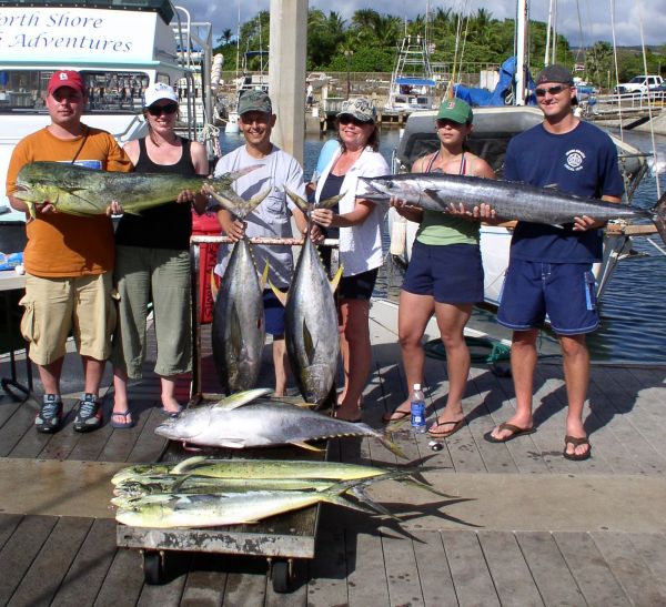 Foxy Lady 7-25-07
Gary, Verna, Gary Sr., Stephanie, Heather and Chris with their terrific catch. Some nice fat Ono's have been biting lately and the Mahi Mahi are getting bigger too! When 6 people go offshore fishing and everyone gets to pull on a few fish, it's a good day.
