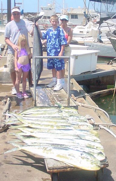  4-07-04
The DeGleder family goes fishing. Evan and Grace caught 11 big Mahi Mahi and a 42 pound Wahoo. They kids even let mom and dad catch a few. Thanks for fishing with us hope to see you again!
